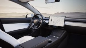 Tesla buys bitcoin (Model 3 white interior)
